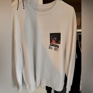 White crewneck sweater
